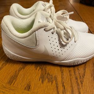 Girls cheerleading white Nike shoes